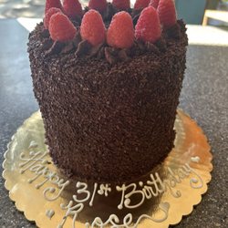 Gold Country Bakery - Chocolate cake with chocolate ganache frosting and raspberry filling.