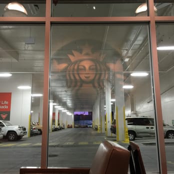 Starbucks - Reflection of giant Starbucks logo~ - Coffee & Tea Near Me - Vancouver, British Columbia