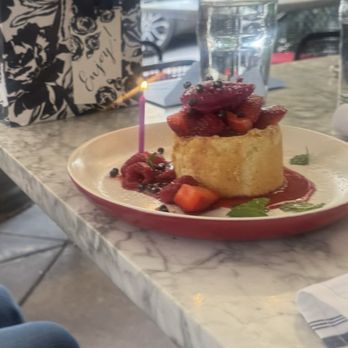 North Italia - Birthday dessert for my friend, cake with strawberries and a dollop of cream cheese frosting on top. - Italian Near Me - Scottsdale, Arizona