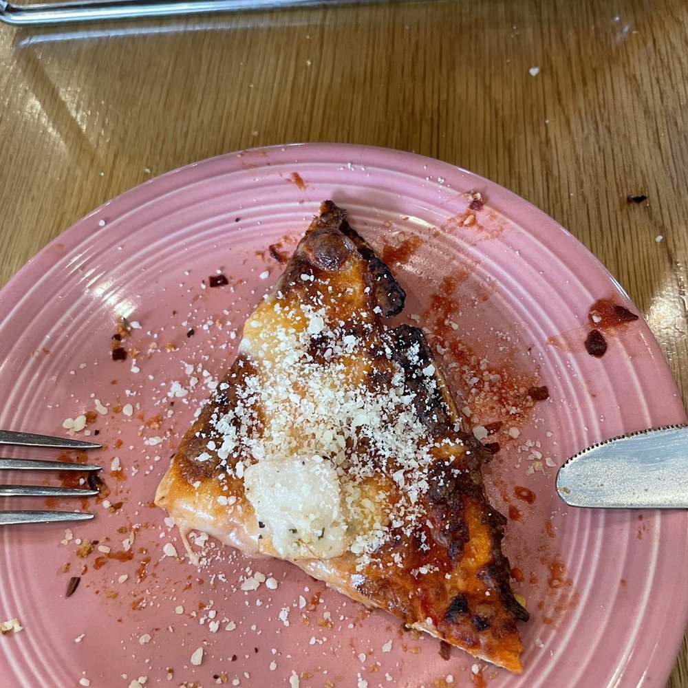 T-Ravs - Piece of chicken and mushroom pizza on Fiestaware! - Pizza Near Me - Jackson, Missouri T-Ravs - Piece of chicken and mushroom pizza on Fiestaware! - Pizza Near Me - Jackson, Missouri