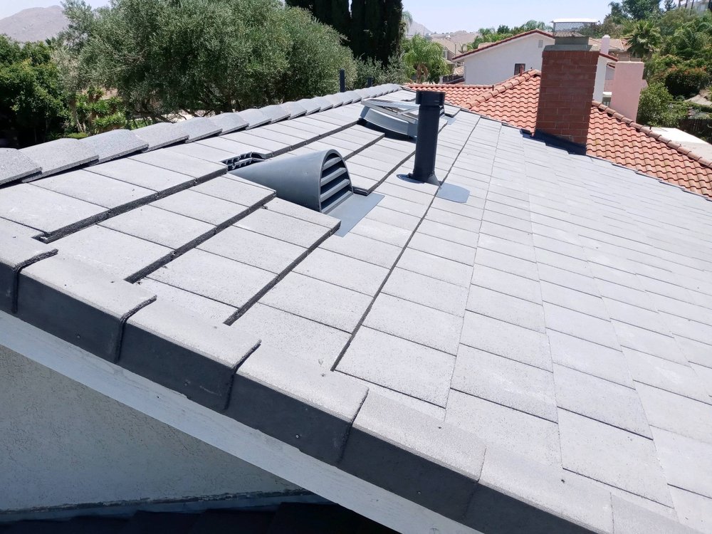 Slide of J P Roofing