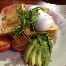 Poached eggs on fat bread with avo and tomato. Poached eggs on fat bread with avo and tomato.