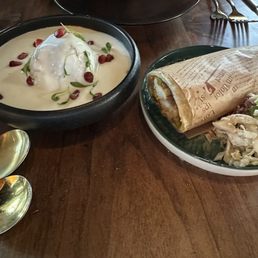 Dahi bhalla on left, chicken kathi roll on right.