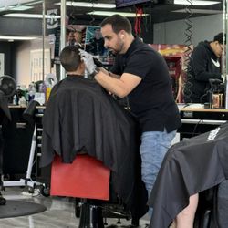 New York's Finest Barber Shop - Thanks Steve. This kid was long overdue for a haircut!