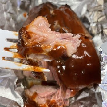 Love That BBQ - a piece of meat on a fork - Barbeque Near Me - Knoxville, Tennessee Love That BBQ - a piece of meat on a fork - Barbeque Near Me - Knoxville, Tennessee