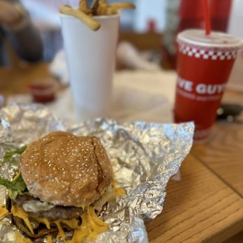 Five Guys - a cheeseburger and fries on a table - Burgers Near Me - El Cajon, California Five Guys - a cheeseburger and fries on a table - Burgers Near Me - El Cajon, California