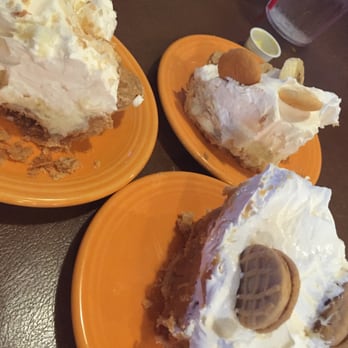 Our Place Restaurant - Nutter Butter, coconut, & Banana pudding pies!!! I don't know which one is better!!! - New American Near Me - Mansfield, Texas Our Place Restaurant - Nutter Butter, coconut, & Banana pudding pies!!! I don't know which one is better!!! - New American Near Me - Mansfield, Texas