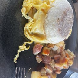 Breakfast Sammy with sauasage and pepperjack. Red potatoes on the side Breakfast Sammy with sauasage and pepperjack. Red potatoes on the side