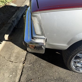 TMC Auto Repair - After TMC auto - Rubber bumper trim along with scratches above missing trim piece. - Auto Repair Near Me - Walnut, California TMC Auto Repair - After TMC auto - Rubber bumper trim along with scratches above missing trim piece. - Auto Repair Near Me - Walnut, California