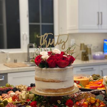 Poul's Bakery - a wedding cake on a platter - Bakeries Near Me - Costa Mesa, California Poul's Bakery - a wedding cake on a platter - Bakeries Near Me - Costa Mesa, California