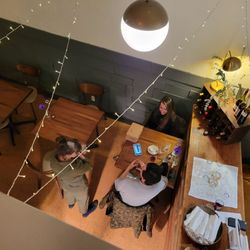 Street Social - View from the loft to the tables downstairs. Can't remember if there's four or six but it's small.