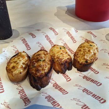 Crawfish Cafe - Crawfish Cheese Bread: crawfish tails, cheese and green onion on toasted baguettes - Seafood Near Me - Houston, Texas