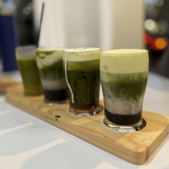 Vivot Craft Cafe - Matcha flight  Left to right: Mango, lavender blueberry with coconut cream, einspanner, blueberry with banana cream top - Bubble Tea Near Me - Fullerton, California