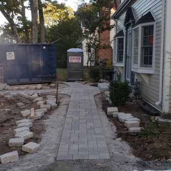 Gilmar's Landscaping - a walkway being built in front of a house - Landscaping Near Me Gilmar's Landscaping - a walkway being built in front of a house - Landscaping Near Me