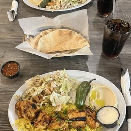 Food pictured: Chicken Kebab Plate, Beef Kebab Plate, and complimentary pita. Food pictured: Chicken Kebab Plate, Beef Kebab Plate, and complimentary pita.