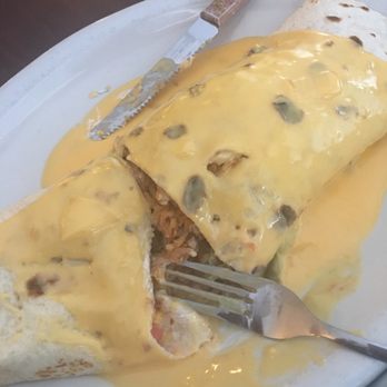 Las Cascadas - Basic, nothing special just melted cheese poured halfway on the burrito & "fajita chicken" is bland nothing smokey or charbroiled about it! - Mexican Near Me - Spring, Texas