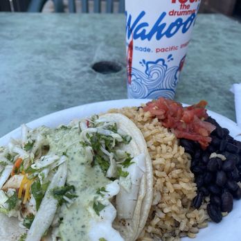 Wahoo's Fish Taco - One taco meal with chicken tacos brown rice and black beans. The green sauce is very good. - Mexican Near Me - Longmont, Colorado Wahoo's Fish Taco - One taco meal with chicken tacos brown rice and black beans. The green sauce is very good. - Mexican Near Me - Longmont, Colorado