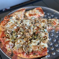 Crust Pizza Co. - Tomball - Sausage, Pepperoni, Mushroom, Basil, Garlic & green olive pizza , absolutely Devine!