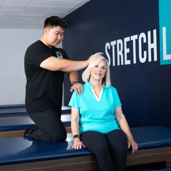 StretchLab - Relieve upper body tension and improve posture with a 1-on-1 assisted neck and shoulder stretch at StretchLab. - Fitness & Instruction Near Me - Livingston, New Jersey StretchLab - Relieve upper body tension and improve posture with a 1-on-1 assisted neck and shoulder stretch at StretchLab. - Fitness & Instruction Near Me - Livingston, New Jersey
