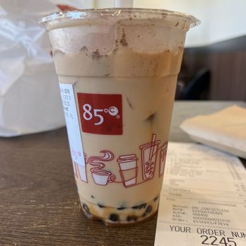 85°C Bakery Cafe-Austin Airport - Pumpkin Spice milk tea iced medium with boba - Coffee & Tea Near Me - Austin, Texas