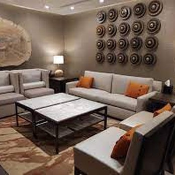 Spa Moab - a living room with couches and a coffee table - Skin Care Near Me - Moab, Utah Spa Moab - a living room with couches and a coffee table - Skin Care Near Me - Moab, Utah