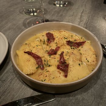 Lilia - Sheep's Milk Cheese Agnolotti, saffron, dried tomato, honey - Italian Near Me - Brooklyn, New York Lilia - Sheep's Milk Cheese Agnolotti, saffron, dried tomato, honey - Italian Near Me - Brooklyn, New York
