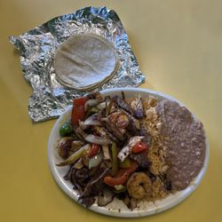 Tacos El Tizon - Mixed fajitas with homemade corn tortillas.