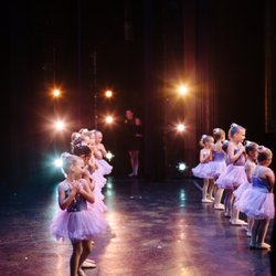 St Augustine Dance Academy - Young dancers performing ballet on stage