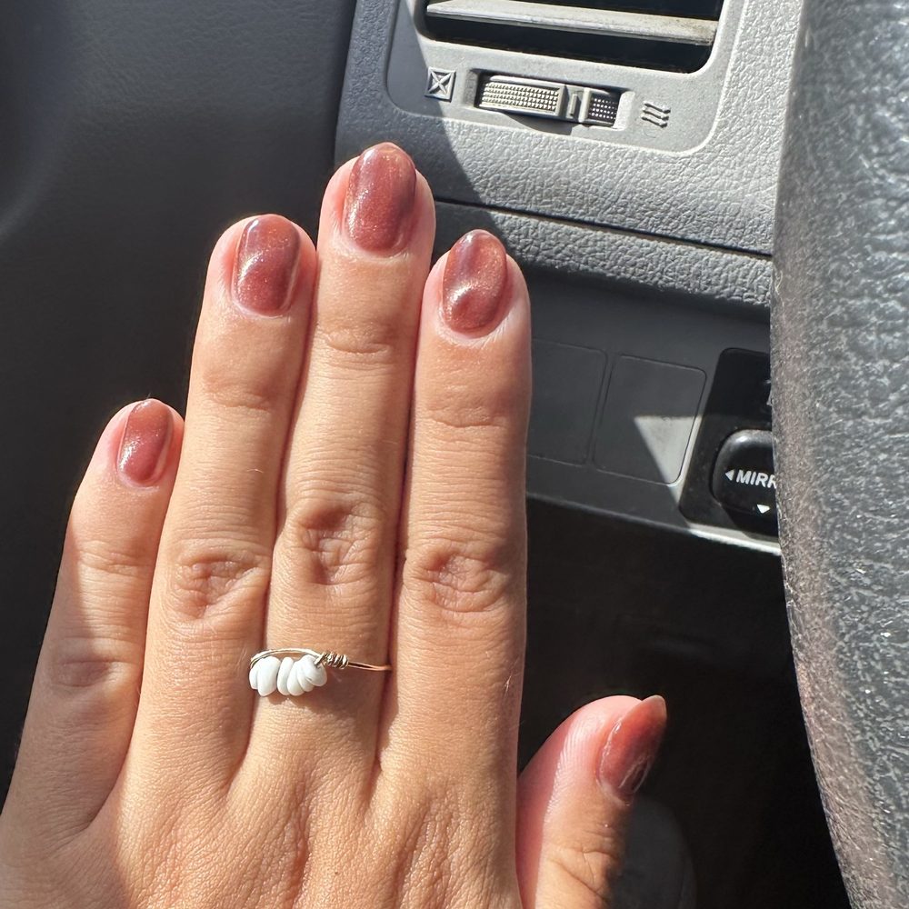 Brown cat eye gel manicure