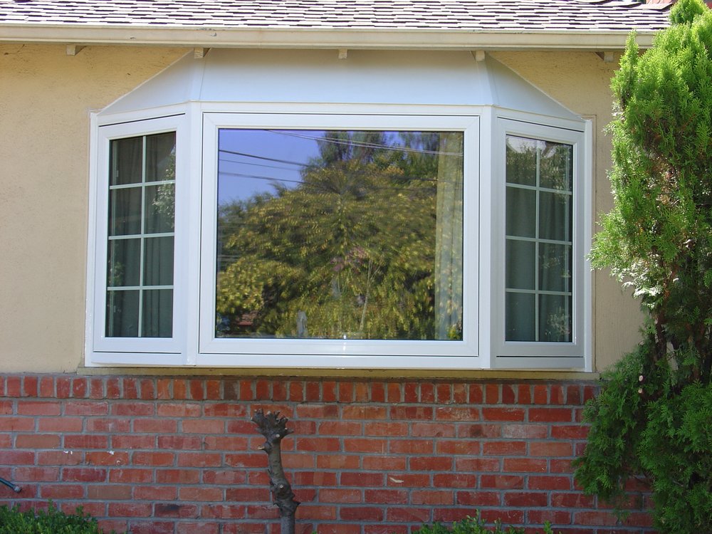 Slide of Clean Builders and Deluxe Windows