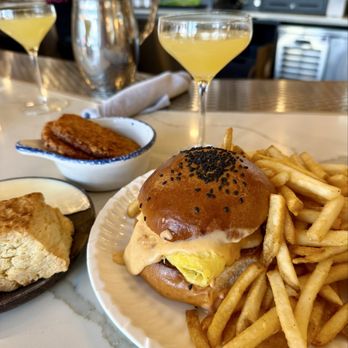Unconventional Diner - S"Eggs"Y Sandwich Hash Browns Mimosa Buttermilk Biscuit & Jam - Breakfast & Brunch Near Me - Washington, DC, District of Columbia