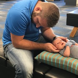 East Valley Chiropractic - Dr. Ty Hall performs a newborn adjustment.