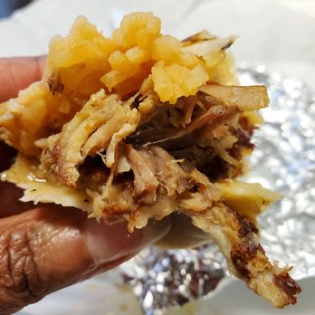 Taco Chon - Inside of a Carnitas burrito. Look at the seasoned juice. - Mexican Near Me - Haltom City, Texas Taco Chon - Inside of a Carnitas burrito. Look at the seasoned juice. - Mexican Near Me - Haltom City, Texas