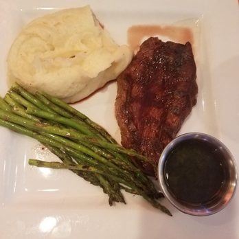 Frix's Fire Grill - Steak cooked perfect, yummy mashed potatoes, and asparagus was just the right addition. - Latin American Near Me - Chester, Maryland Frix's Fire Grill - Steak cooked perfect, yummy mashed potatoes, and asparagus was just the right addition. - Latin American Near Me - Chester, Maryland