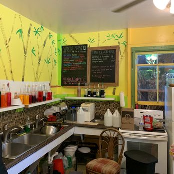 Sweet Tooth Shave Ice - a kitchen area with a counter, sink, and refrigerator - Shaved Ice Near Me - Kapaau, Hawaii Sweet Tooth Shave Ice - a kitchen area with a counter, sink, and refrigerator - Shaved Ice Near Me - Kapaau, Hawaii