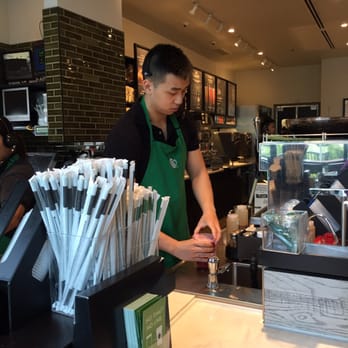 Starbucks - a bari serving a customer at a coffee shop - Coffee & Tea Near Me - Vancouver, British Columbia Starbucks - a bari serving a customer at a coffee shop - Coffee & Tea Near Me - Vancouver, British Columbia