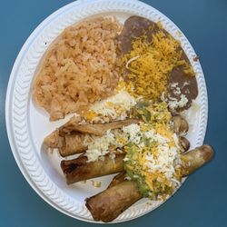 Ruperto's Mexican Food - Burnt taquitos with cold rice and beans.