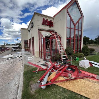 Arby's - a pile of debris in front of a store - Fast Food Near Me - Show Low, Arizona