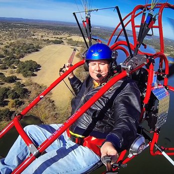 US Paragliding - Ashton testing a New Green Eagle for a Houston Fire Fighter over Lake LBJ at the US Paragliding school - Paragliding Near Me - Marble Falls, Texas