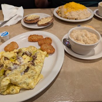 The Echo - The Lumberjack with side of potato cakes, gravy and biscuit. Hot Mess with English Muffin, side of gravy top of photo. - Diners Near Me - Cincinnati, Ohio