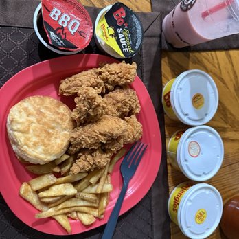 Bojangles - Labeled sauces with labeled sides and dessert, with actual entree on a plate at home - Fast Food Near Me - Manor, Texas