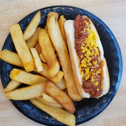 Barely warm fries. Cold chili-cheese hot dog. Chili was not hot enough to melt the cheese. Will not return. Barely warm fries. Cold chili-cheese hot dog. Chili was not hot enough to melt the cheese. Will not return.