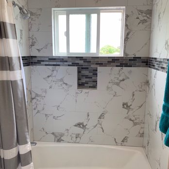 CW Handyman - Here is the new bath tub and tub surround after all floor work is done. - Handyman Near Me