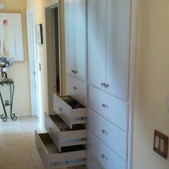 Mac's Remodeling, Inc. - Custom built cabinet and storage taking the place of two hall closets. - General Contractors Near Me Mac's Remodeling, Inc. - Custom built cabinet and storage taking the place of two hall closets. - General Contractors Near Me