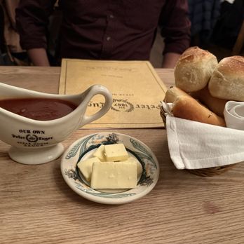 Peter Luger - bread, butter, and steak sauce - Steakhouses Near Me - Brooklyn, New York Peter Luger - bread, butter, and steak sauce - Steakhouses Near Me - Brooklyn, New York