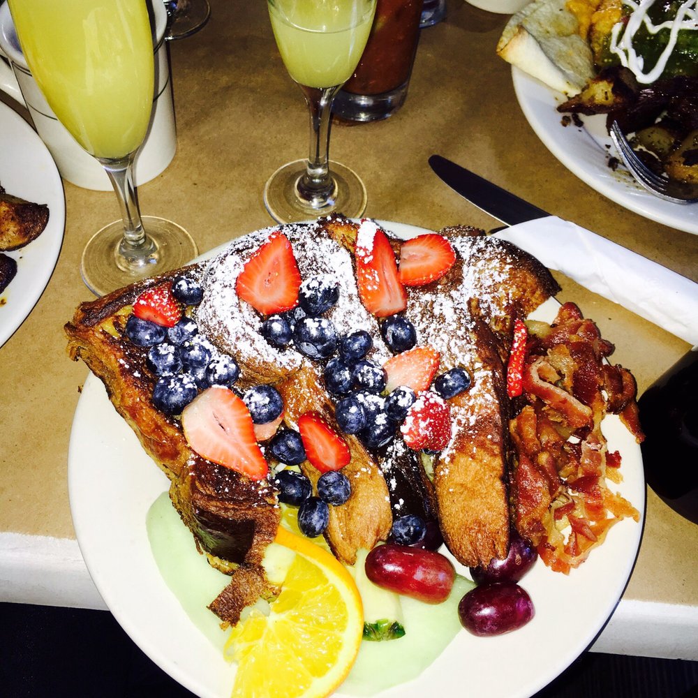 Harefield Road - French Toast - battered challah bread served with fresh fruit and bacon - Bars Near Me - Brooklyn, New York Harefield Road - French Toast - battered challah bread served with fresh fruit and bacon - Bars Near Me - Brooklyn, New York