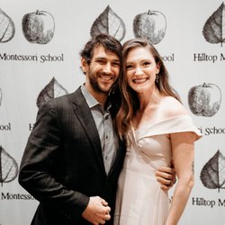 Hilltop Montessori - My husband and I grinning ear to ear at our school's annual fundraiser. We love Hilltop Montessori!