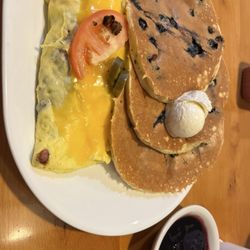 Bacon omelet with blueberry pancakes