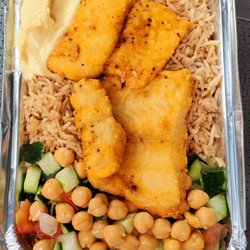 Shah's Halal Food - Fish over rice, with salad, chick peas, and hummus. Nice tender, crispy fish. Delicious rice.