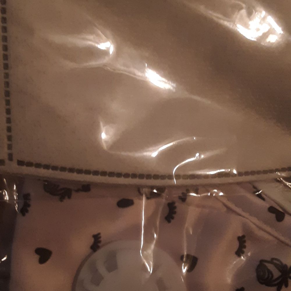$20 for a cheaply made cloth mask with heavy duty coffee filter insert.